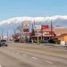 California town with snow capped mountains in the background